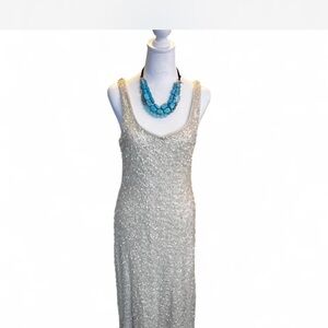 Glam vibes! Cream Sequin Maxi Dress. Stretch fabric in the lining for comfort!
